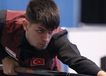 لاعب البلياردو التركي سيمن أوزباش بطلاً للعالم